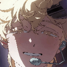 a close up of a person 's face with a headset on