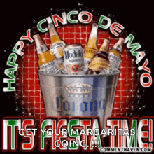 a picture of a bucket filled with bottles and cans of beer