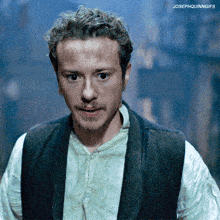 a close up of a man 's face with the words josephquinngifs below it