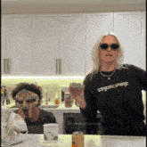 a woman wearing a black shirt that says linkin park
