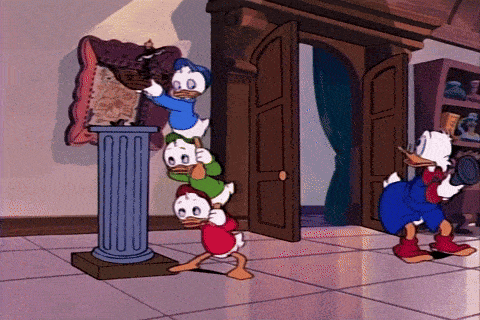 The nephews drop Scrooge's boat and Scrooge catches it