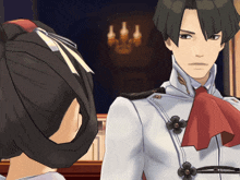 a man and a woman are looking at each other