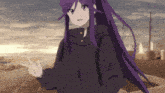a girl with purple hair is wearing a black hoodie and pointing at something