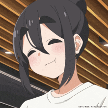 a close up of a girl 's face with chinese writing on the bottom right corner
