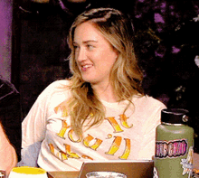 a woman wearing a t-shirt that says " you 'll "