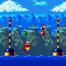 a video game with a monkey and a penguin hanging from a rope