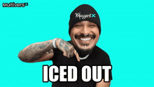 a man wearing a hat that says blizzard iced out on it