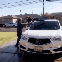 Blow Dry Car Car Cleaning GIF - Blow Dry Car Car Cleaning Maintain Car GIFs