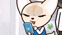 a cartoon fox is looking at a cell phone with a crescent moon on it
