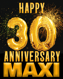 a sign that says happy 30th anniversary maxi with fireworks in the background