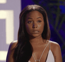 a woman with a tattoo on her arm that says ' i love you ' on it