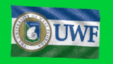 a blue white and green flag with the university of west florida on it