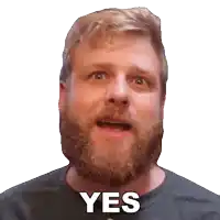 a man with a beard is making a yes sign