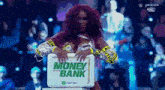 a woman is holding a box that says money bank on it
