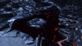a close up of a spider man in a video game with a circle in the middle