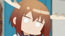 a cartoon character with antlers on her head making a face