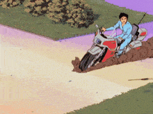a man riding a motorcycle down a dirt road