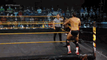 Andre Chase Stunner Into Ring And Moonsault GIF - Andre Chase Stunner Into Ring And Moonsault GIFs