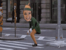 hop elf crosswalk crossing the road smiling