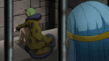 a girl with green hair is sitting in a jail cell behind bars