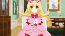 a girl in a pink dress with a skull on her head stands with her arms crossed