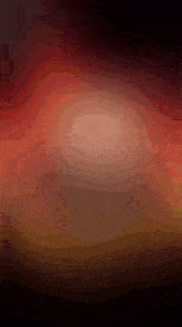 a dark red background with a swirl in the center