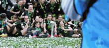 a group of soccer players are posing for a photo