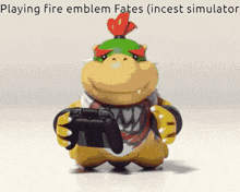 a figurine of bowser holding a game controller with the caption playing fire emblem fates