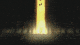 a close up of a person 's face with a fire coming out of it