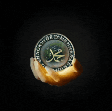 a hand is holding a coin that says snack video