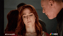 a man and a woman are looking at each other and the chicagopd logo is on the bottom
