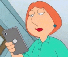 lois griffin from family guy is taking a picture of herself with her cell phone .