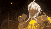 a man with white hair and yellow eyes is holding a glowing object in his hands .