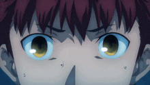 a close up of a person 's eyes with a surprised look on his face