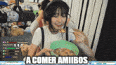 a woman eating cereal with the words a comer amiibos on the bottom