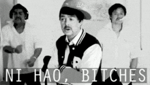 a black and white photo of three men with the words ni hao bitches in the upper right corner