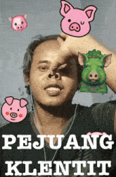 a man with pigs on his face and the words pejuang klentit