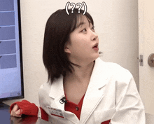 a woman in a lab coat with a name tag that says dr popular