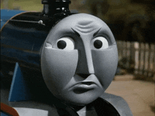 a close up of a cartoon character 's face with an angry look on it