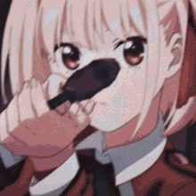 a close up of a girl with a microphone sticking out of her mouth