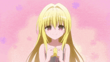 a girl with blonde hair and pink eyes is holding a star