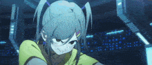 a girl with pigtails and a yellow shirt is making a funny face in a dark room .