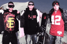 a man wearing a san francisco 49ers shirt stands between two other men