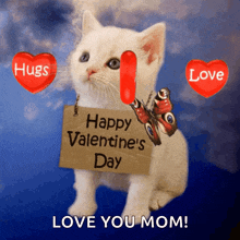 a kitten is holding a card that says happy valentine 's day