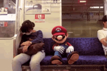 Mario GIF - Mario Sleeping Train GIFs