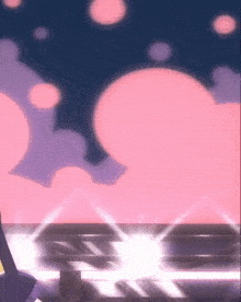 a pink and purple background with a few clouds in it