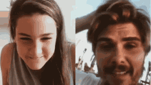 a girl and a man are smiling and looking at each other