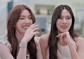 two women are smiling and laughing with tumblr written on the bottom right