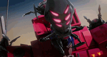 a robot with glowing eyes is sitting on top of a red truck