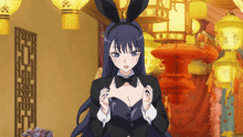 a girl with bunny ears and a bow tie is standing in front of lanterns